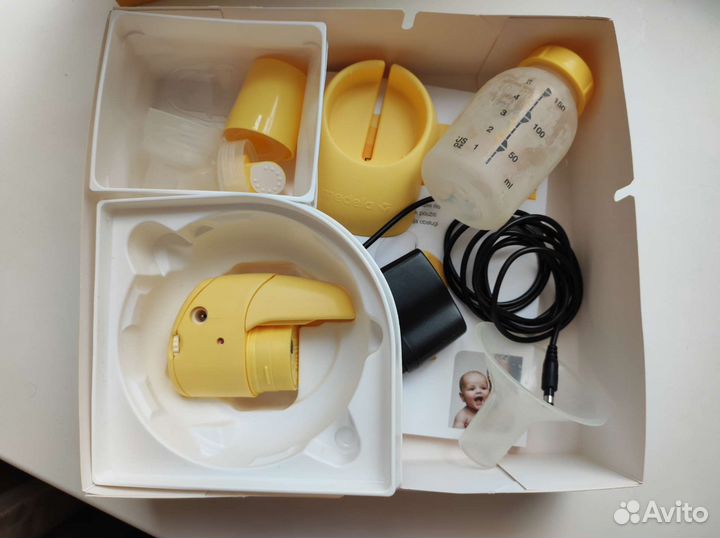 Молокоотсос medela электрический