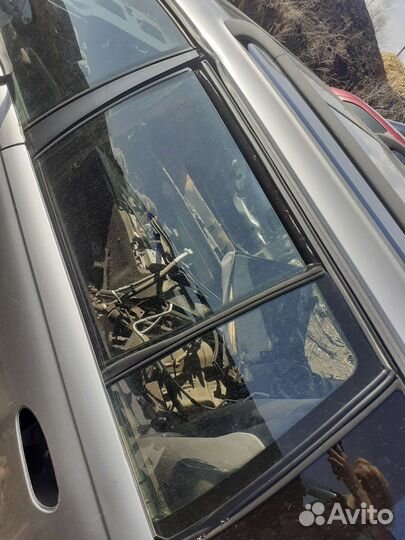 Заднее левое стекло Opel Omega B универсал