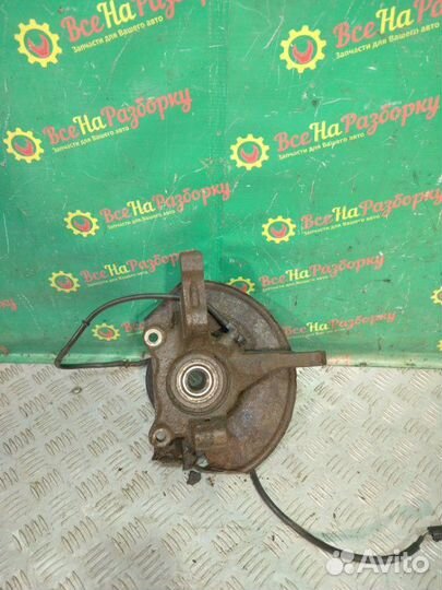 Поворотный кулак передний правый Mitsubishi Lancer