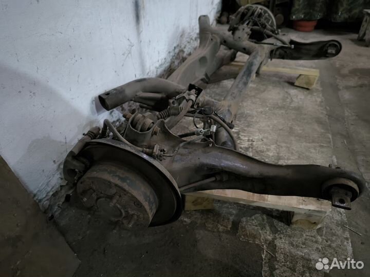 Подрамник lancer 10 задний в сборе