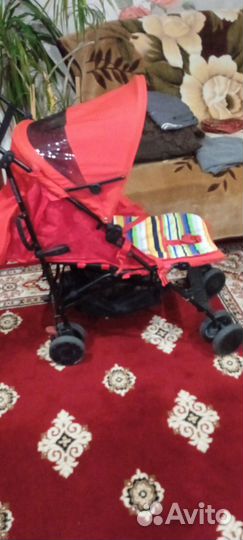 Продам детскую прогулочную коляску цвет красный