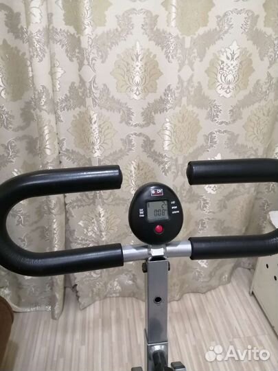 Гребной тренажер