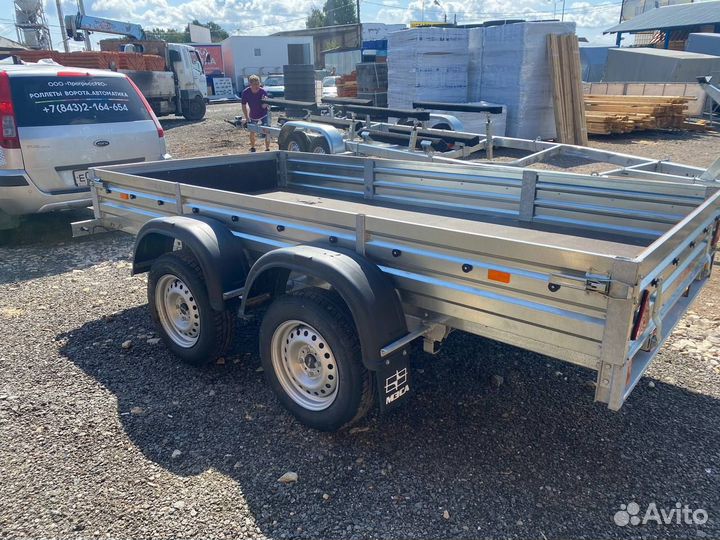 Двухосный прицеп 31.022 с тентом 150. Для техники