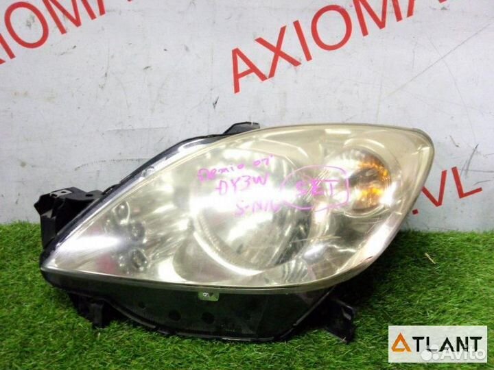 Фара левая mazda demio
