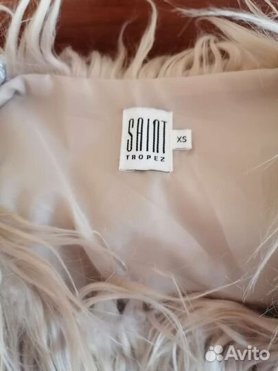 Жилетки меховые женские