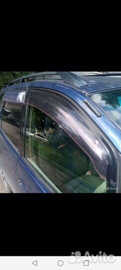 Ветровик передний правый Toyota Spasio AE111