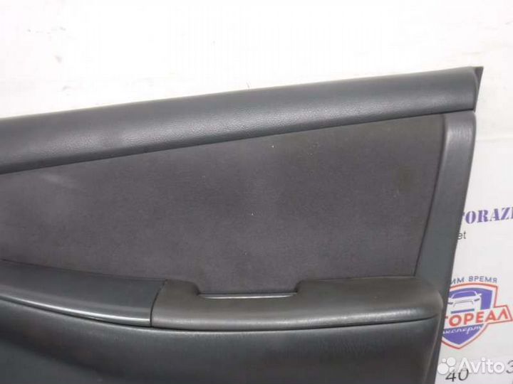 Обшивка двери передняя правая Toyota Corolla 124