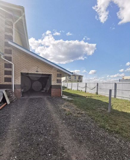 Коттедж 296 м² на участке 12 сот.