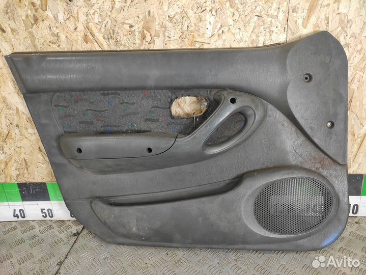 Обшивка двери передней левой Hyundai Accent 1994-2