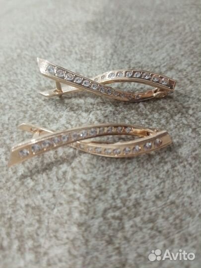 Продам золотые серьги