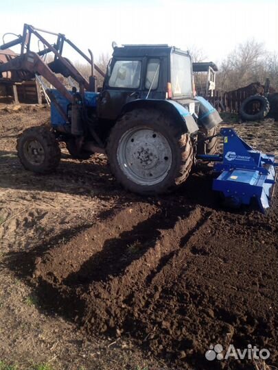 Вспашка земли фрезой. мтз