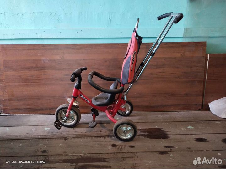 Трехколесный велосипед с ручкой