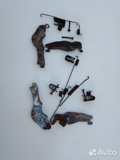 Механизм разведения колодок Nissan