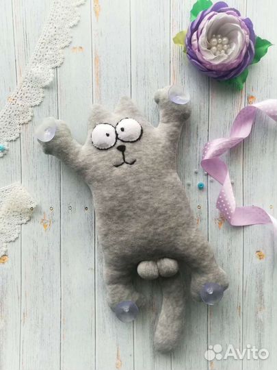 Кот на присосках