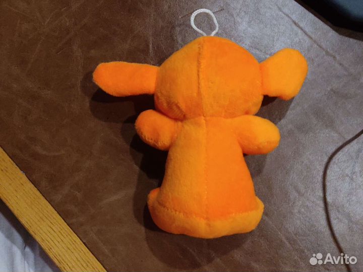 Оранжевая плюшевая игрушка 