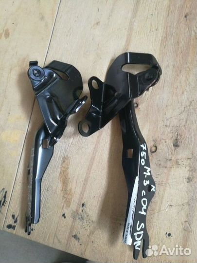 Петля капота Mazda 3 2004