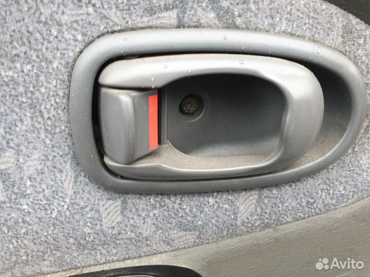 Обшивка двери задней левой Kia Spectra