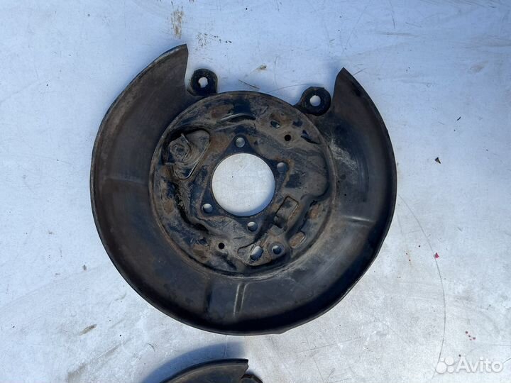 Пыльник тормозного диска задний Nissan Tiida