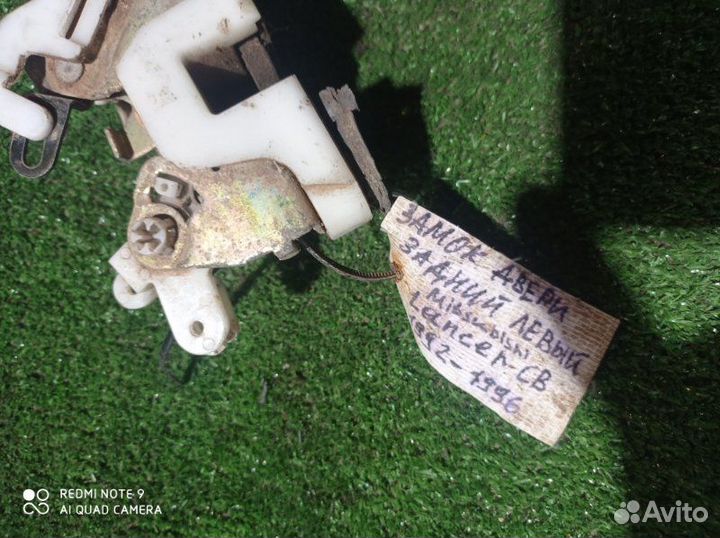 Замок двери задний левый Mitsubishi Lancer 7 C74A