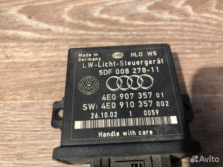 Блок управления корректора фар A3 A4 A6 A8 Q7