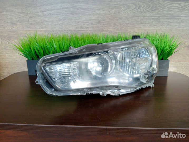 Фара левая Mitsubishi Lancer X P6117
