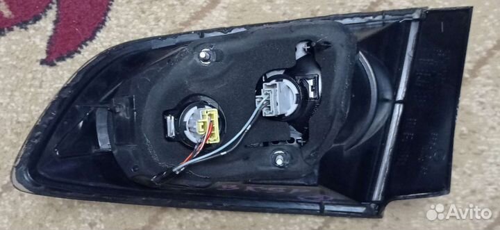 Фонарь задний левый Mazda 3BK седан оригинал