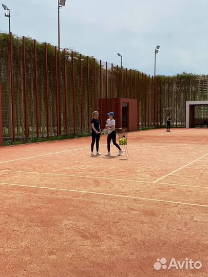 Тренер по большому теннису