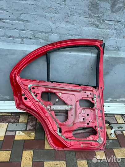 Дверь задняя левая Nissan Almera N16 1.5 2004