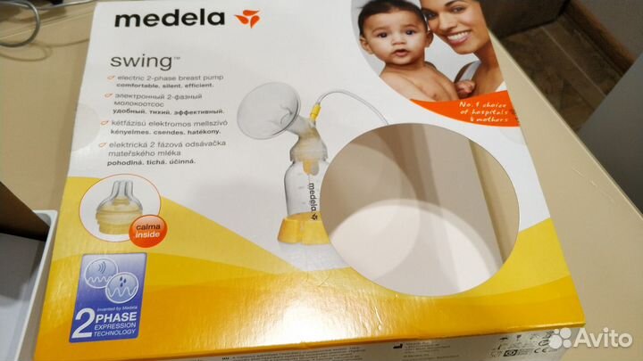 Молокоотсос Medela swing электрический