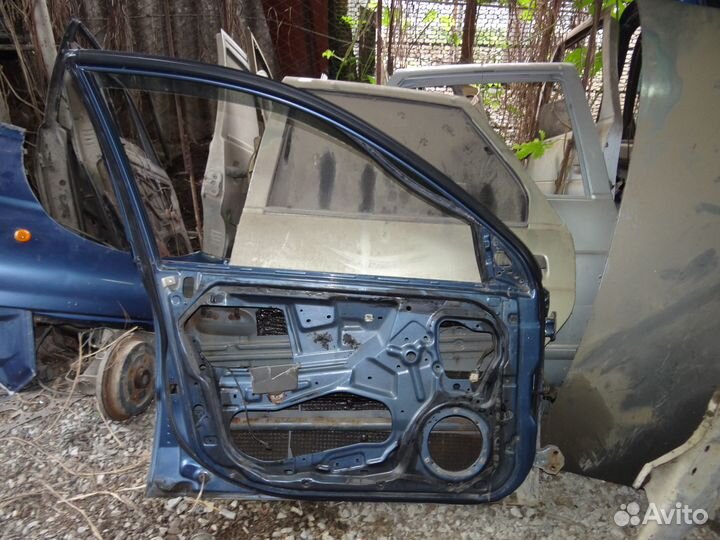 Дверь передняя левая Kia Rio I (1999–2002)