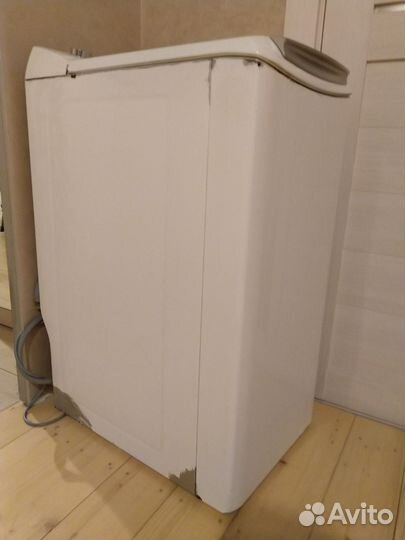 Вертикальная стиральная машина Brandt