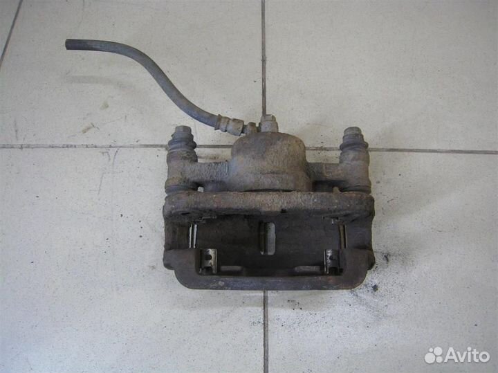 Суппорт тормозной передний левый KIA Picanto (BA)