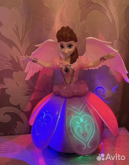 Танцующая кукла