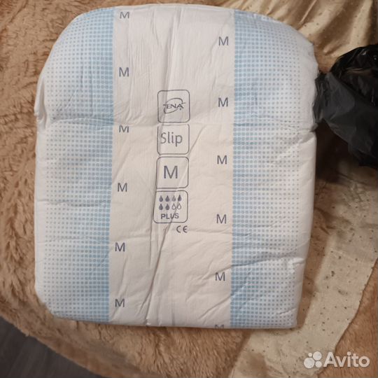 Подгузники М