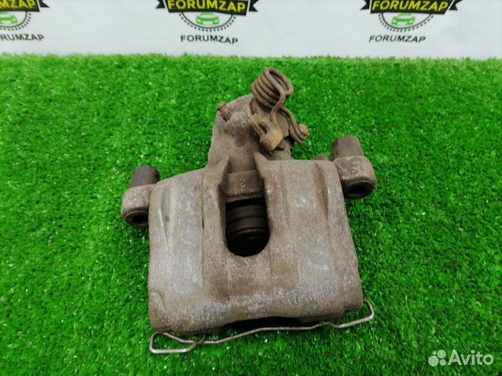 Суппорт тормозной задний правый Ford Focus