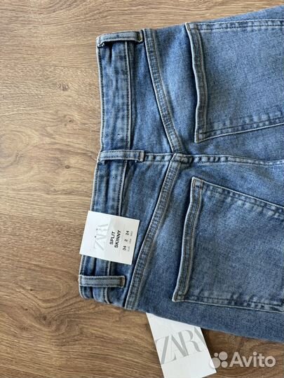 Джинсы zara с разрезами 34