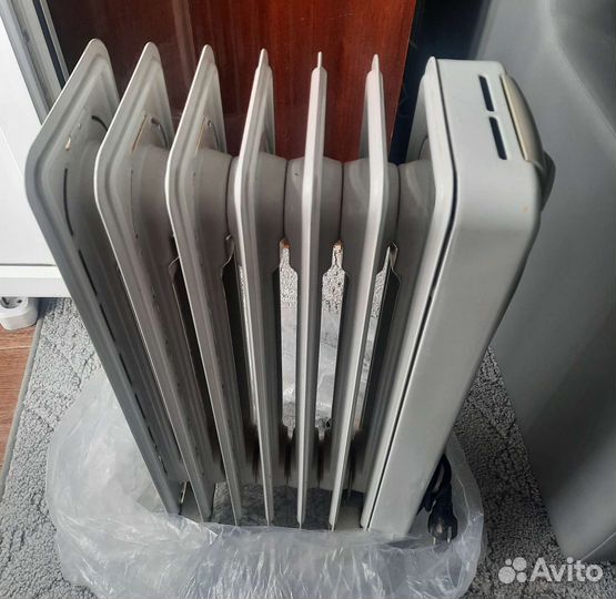 Масляный обогреватель delonghi
