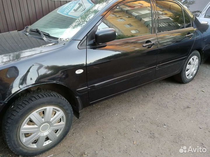 Mitsubishi lancer 9 дверь всборе, крыло