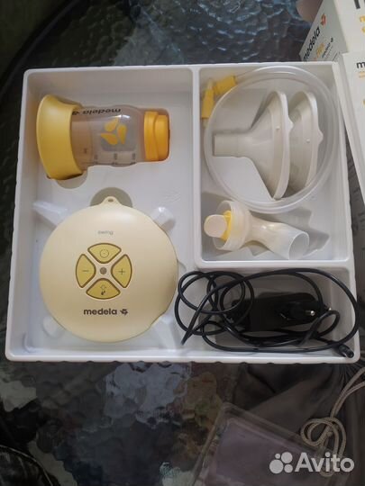 Электрический молокоотсос medela электрический