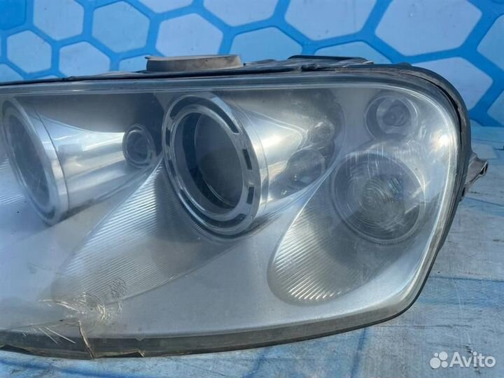 Фара левая ксенон 7L6941017BM
