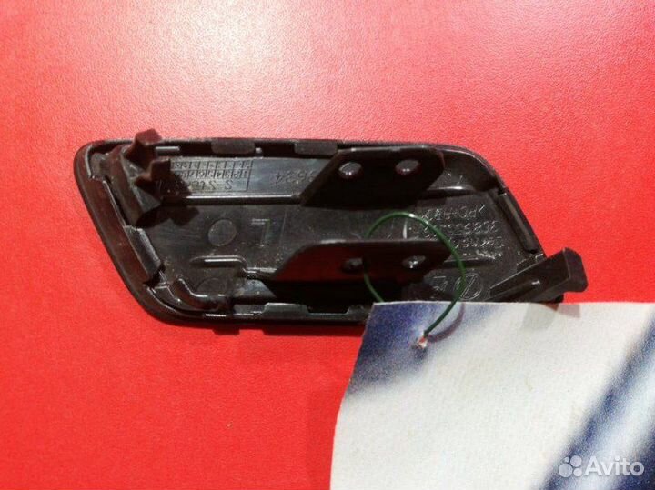 Крышка форсунки омывателя фар передняя левая