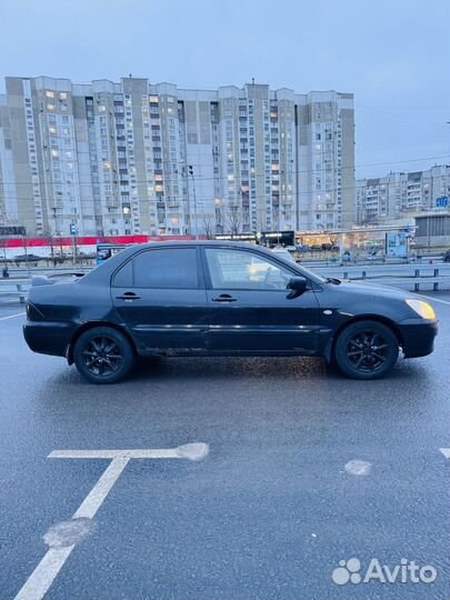 Mitsubishi Lancer 1.6 AT, 2004, 383 524 км