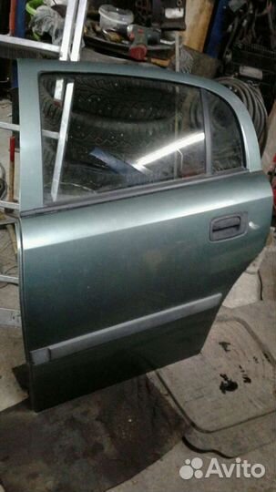 Дверь opel astra G