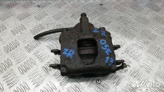 Суппорт тормозной задний правый chrysler voyager 4