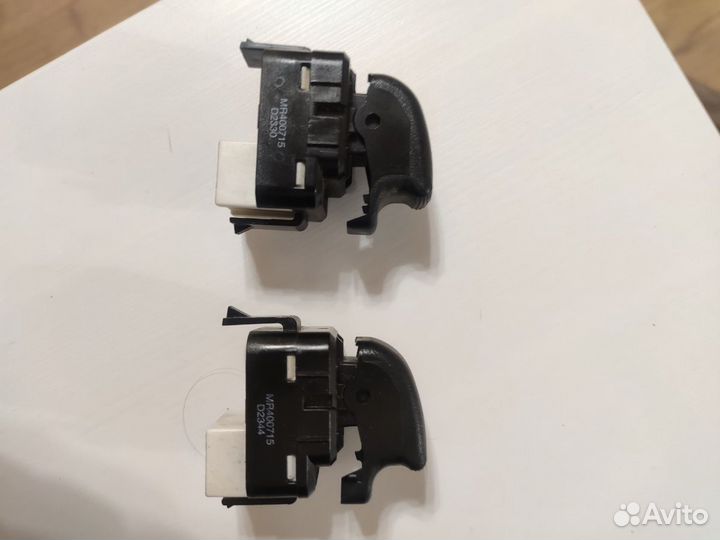 Кнопки управления стеклоподъемниками на Mitsubishi