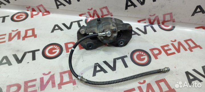 Суппорт тормозной передний левый Mitsubishi