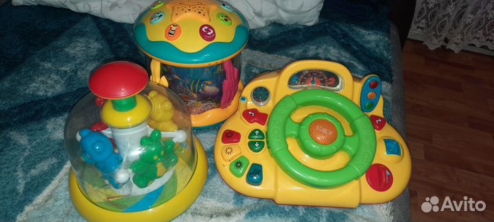 Игрушки: юла, звёздное небо и звук,руль интерактый