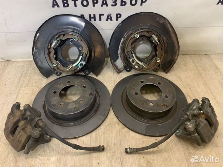 Суппорта и диски задняя Mitsubishi Lancer 10 CY3A