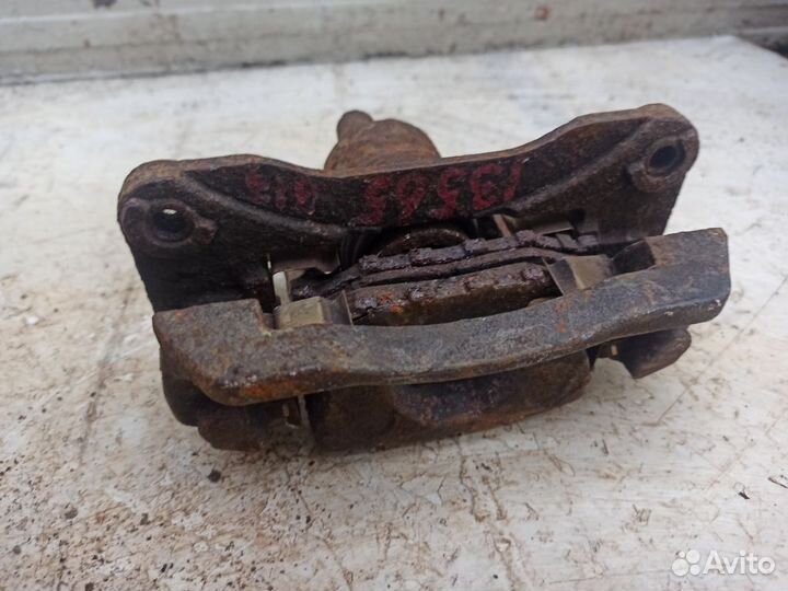 Суппорт задний левый