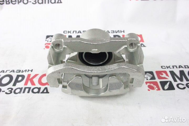 Суппорт тормозной передний правый Nissan X-Trail